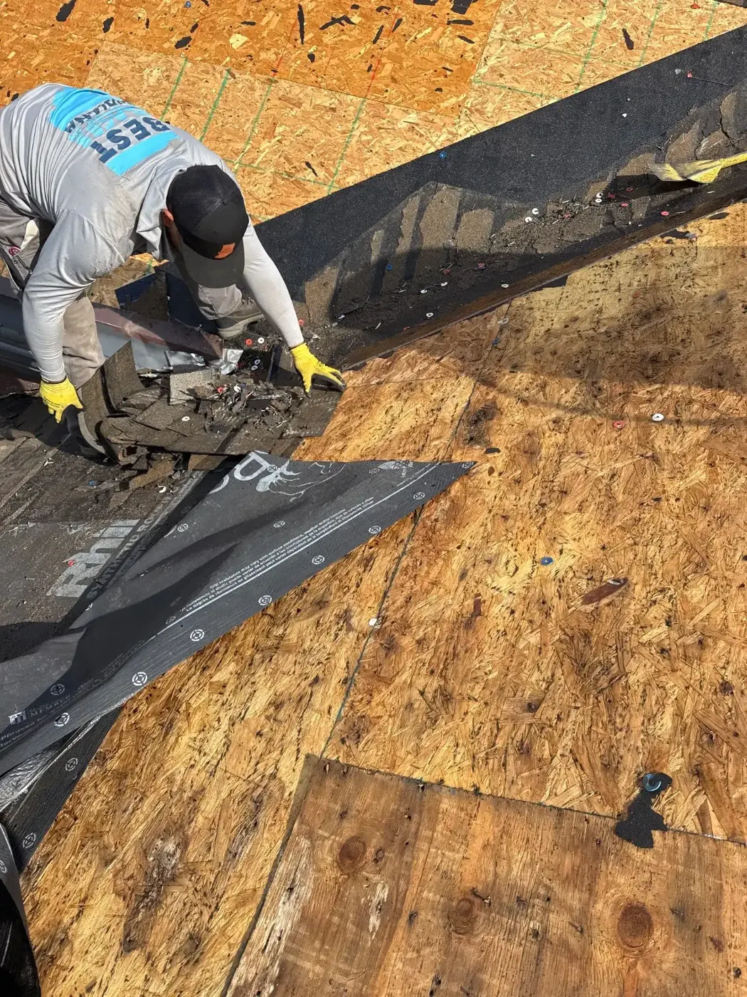Tarping and dry-in on a Eaton commercial roof
